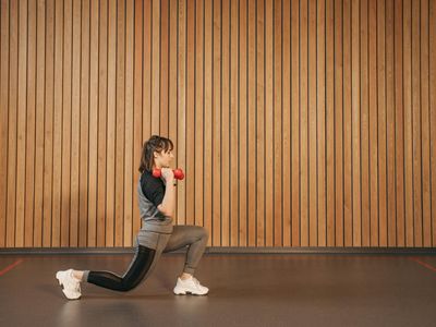 Side view of an athlete engaging their core muscles.